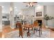 Dining room showcases an open layout, seamlessly connecting the kitchen and the fireplace at 1637 Bent Oaks Blvd, Deland, FL 32724