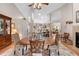 Elegant dining room with hardwood floors, and views of the kitchen at 1637 Bent Oaks Blvd, Deland, FL 32724