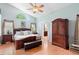 Bright main bedroom boasts vaulted ceilings, a ceiling fan and an en-suite bathroom at 1637 Bent Oaks Blvd, Deland, FL 32724