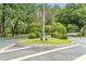 Scenic street view with green median featuring ornamental trees and landscaping at 1637 Bent Oaks Blvd, Deland, FL 32724