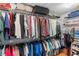 Walk-in closet with well-organized clothing racks and overhead storage at 1637 Bent Oaks Blvd, Deland, FL 32724
