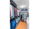Walk-in closet with clothing racks on both sides and overhead storage at 1637 Bent Oaks Blvd, Deland, FL 32724