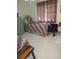 This bedroom features a pair of twin beds, a dresser, and carpeted floors at 1640 Juno Trl # 103F, Astor, FL 32102