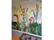This hallway features a colorful mural, adding an artistic touch to the living space at 1640 Juno Trl # 103F, Astor, FL 32102