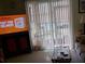 Comfortable living room area with sliding glass doors opening to outdoor space at 1640 Juno Trl # 103F, Astor, FL 32102
