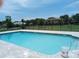 Community pool offers refreshing relaxation and a great way to enjoy sunny days at 1640 Juno Trl # 103F, Astor, FL 32102