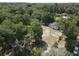 An aerial view of the acreage, showcasing the yard and detached building at 1880 N Sparkman Ave, Orange City, FL 32763