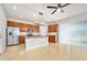 Bright kitchen features wood cabinets, granite countertops, stainless steel appliances, and an island at 1923 Mendocino Ln, Port Orange, FL 32128