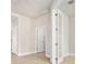 Bright office with neutral walls, tile flooring, and stylish folding doors for privacy at 1923 Mendocino Ln, Port Orange, FL 32128