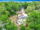 Aerial view of a home surrounded by lush greenery and mature trees at 200 Alpine St, Altamonte Springs, FL 32701