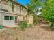 Patio with dining table and lush landscaping at 200 Alpine St, Altamonte Springs, FL 32701