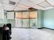 Bright bonus room with large window, tile flooring, and AC unit at 200 Alpine St, Altamonte Springs, FL 32701