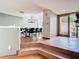 Dining room with hardwood floors, modern chandelier, and an open view to the entryway at 200 Alpine St, Altamonte Springs, FL 32701