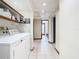 Laundry room featuring tile floors, washer, dryer, and access to the bathroom at 200 Alpine St, Altamonte Springs, FL 32701