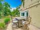 Outdoor patio space with a dining set perfect for enjoying outdoor meals at 200 Alpine St, Altamonte Springs, FL 32701