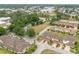 Aerial view of a community with beautiful landscaping and tree coverage at 201 Dyson Dr, Deland, FL 32724