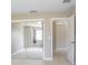 Neutral bedroom with mirrored closet, carpet flooring, and natural light at 201 Dyson Dr, Deland, FL 32724