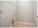 Laundry room with tile flooring and wire shelving at 201 Dyson Dr, Deland, FL 32724