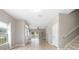 Living room features tile flooring and access to the patio at 201 Dyson Dr, Deland, FL 32724