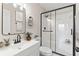 Modern bathroom featuring a glass shower door and new fixtures at 2106 Umbrella Tree Dr, Edgewater, FL 32141