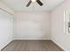Simple bedroom with closet, ceiling fan, and natural light at 2106 Umbrella Tree Dr, Edgewater, FL 32141
