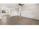 Spacious living room with gray flooring, offering a versatile space with great natural light and an open layout at 2106 Umbrella Tree Dr, Edgewater, FL 32141