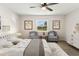 Cozy main bedroom showcases a calming color palette, comfortable seating, and stylish decor for a relaxing retreat at 2106 Umbrella Tree Dr, Edgewater, FL 32141