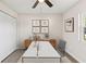 Well-lit home office with modern desk and closet space at 2106 Umbrella Tree Dr, Edgewater, FL 32141