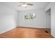 Bright bedroom with hardwood floors, closet and a ceiling fan at 2215 Lake Ruby Rd, Deland, FL 32724