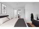 Bedroom with hardwood floors, comfortable bed, and a closet at 2215 Lake Ruby Rd, Deland, FL 32724