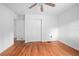 Bedroom featuring hardwood floors, closet space and natural light at 2215 Lake Ruby Rd, Deland, FL 32724