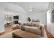 Cozy living area with stylish decor and a view of the adjacent dining and kitchen at 2215 Lake Ruby Rd, Deland, FL 32724
