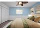 Inviting bedroom with a comfortable bed, soft lighting, and a relaxing atmosphere at 2226 Sherwood Dr, South Daytona, FL 32119
