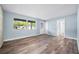 Spacious living area features durable wood-look floors, and easy access to dining and other living spaces at 2226 Sherwood Dr, South Daytona, FL 32119