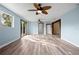 Spacious living room showcasing wood-look floors and natural light, ready for personalization at 2226 Sherwood Dr, South Daytona, FL 32119