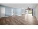 Expansive living area with wood-look floors and excellent connectivity to the dining and lounge area at 2226 Sherwood Dr, South Daytona, FL 32119