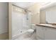 Bathroom featuring tiled shower and granite countertop at 2747 Date Palm Dr, Edgewater, FL 32141