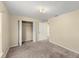 Bedroom featuring a closet, neutral walls, and carpet at 2747 Date Palm Dr, Edgewater, FL 32141
