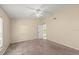 Neutral bedroom features carpet, neutral walls, and ceiling fan at 2747 Date Palm Dr, Edgewater, FL 32141