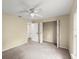 Spacious bedroom boasts neutral walls, carpet, and bright natural lighting at 2747 Date Palm Dr, Edgewater, FL 32141