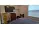 Functional bedroom with bright accents, ample storage, and a comfortable bed at 27751 Luella Ave, Paisley, FL 32767