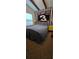 Cozy bedroom features unique decor and ample natural light at 27751 Luella Ave, Paisley, FL 32767