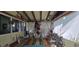 Bright sunroom with eclectic decor and exercise equipment, perfect for relaxation at 27751 Luella Ave, Paisley, FL 32767