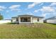 Enjoy outdoor living in this home's large backyard, perfect for entertaining and relaxing at 2884 Sweet Springs St, Deltona, FL 32738