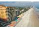 Gorgeous view of the condo building with the ocean in the background from above on a sunny day at 2901 S Atlantic Ave # 401, Daytona Beach Shores, FL 32118