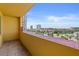 Outdoor balcony with tiled floor and colorful retaining wall with a clear view of the city at 2901 S Atlantic Ave # 401, Daytona Beach Shores, FL 32118