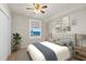 Bedroom with a plant, view of the ocean, and a closet at 2901 S Atlantic Ave # 401, Daytona Beach Shores, FL 32118