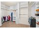 Organized walk-in closet with ample shelving and hanging space at 2901 S Atlantic Ave # 401, Daytona Beach Shores, FL 32118