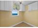 Convenient laundry room with modern appliances and ample storage at 2901 S Atlantic Ave # 401, Daytona Beach Shores, FL 32118
