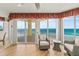 Bright living room with access to a balcony and breathtaking ocean views at 2901 S Atlantic Ave # 401, Daytona Beach Shores, FL 32118